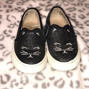 Black and white slip on toddler shoe